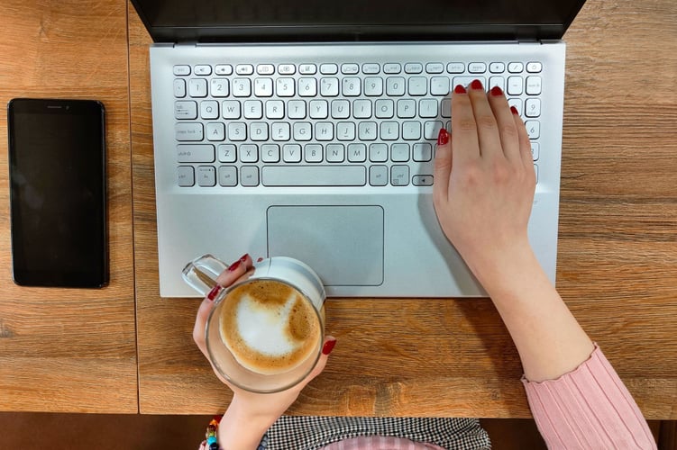 woman ordering food on laptop