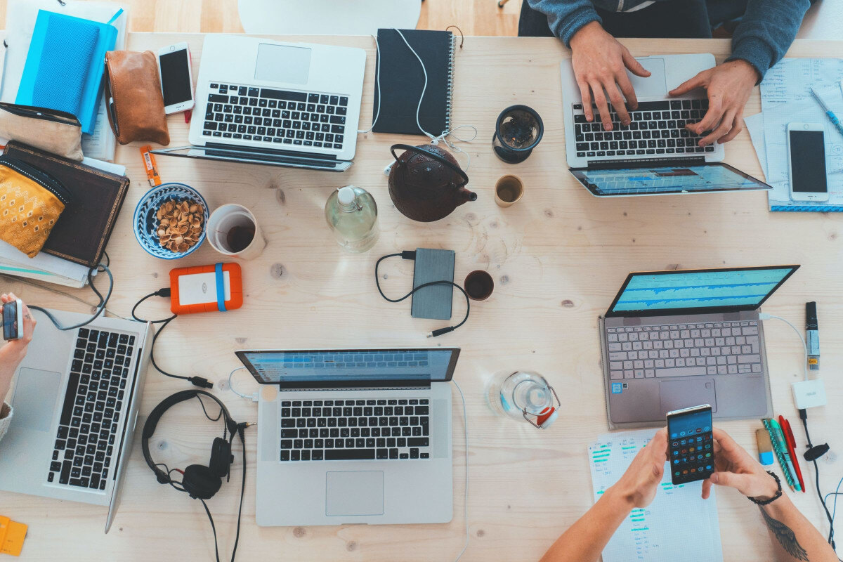 people working on loyalty program design at a table