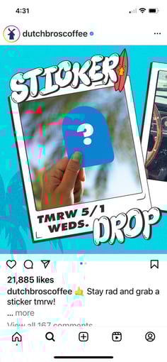 A hand holding a blue card

Description automatically generated