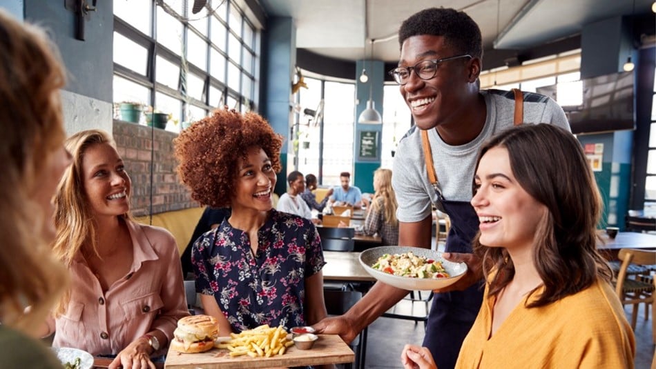 Waiter Serving Group Of Female Friends Meeting For Drinks And Food In Picture Id1146671798 (1)