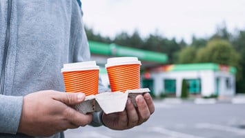 Man Holds Two Cups Of Coffee In His Hands At A Gas Station Picture Id1280051244 (1)