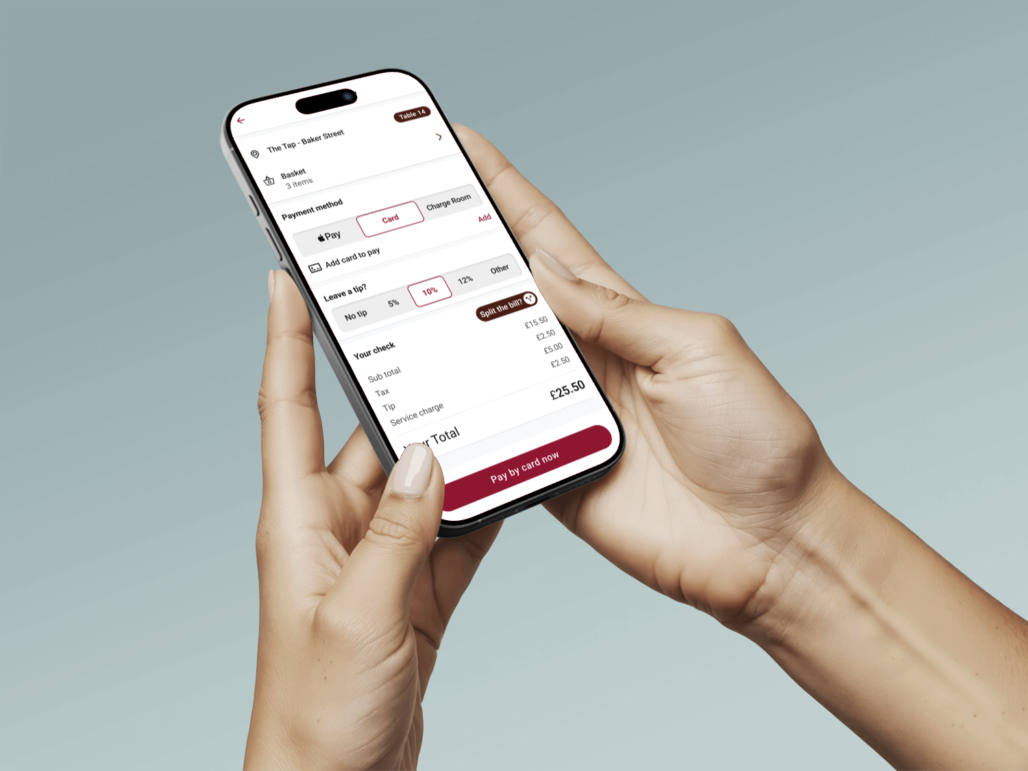 person holding phone pay at table